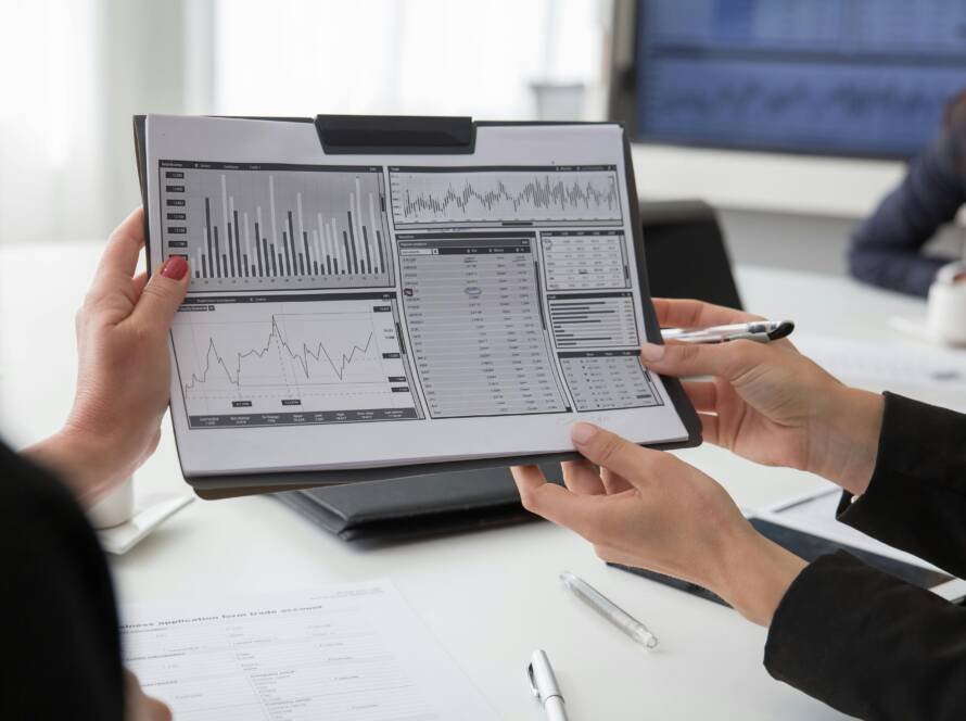 Hotel revenue team reviewing performance charts and KPIs during a commercial deep dive analysis.